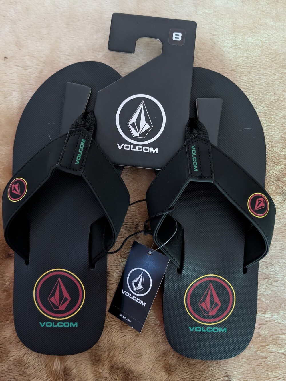 Volcom Men's Black Flip Flops with Red and Yellow Logo Accents